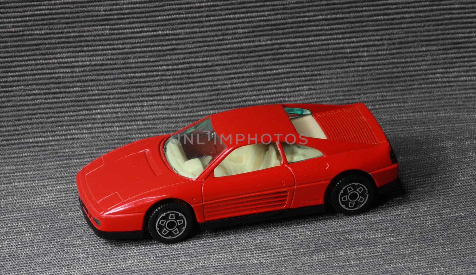 red car small toy still life