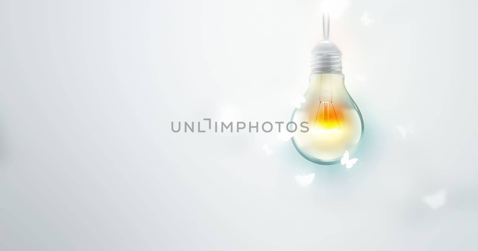 Luminous Bulb And Butterflies Flying On Light