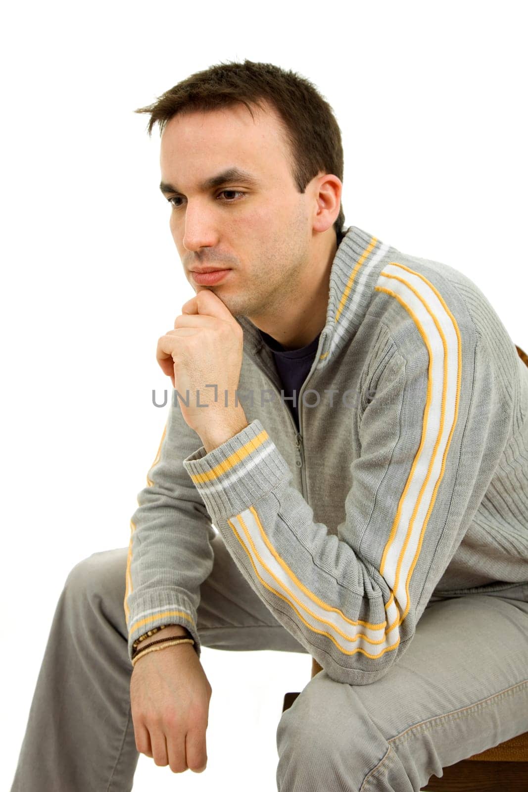 studio picture of a casual young man, isolated on white