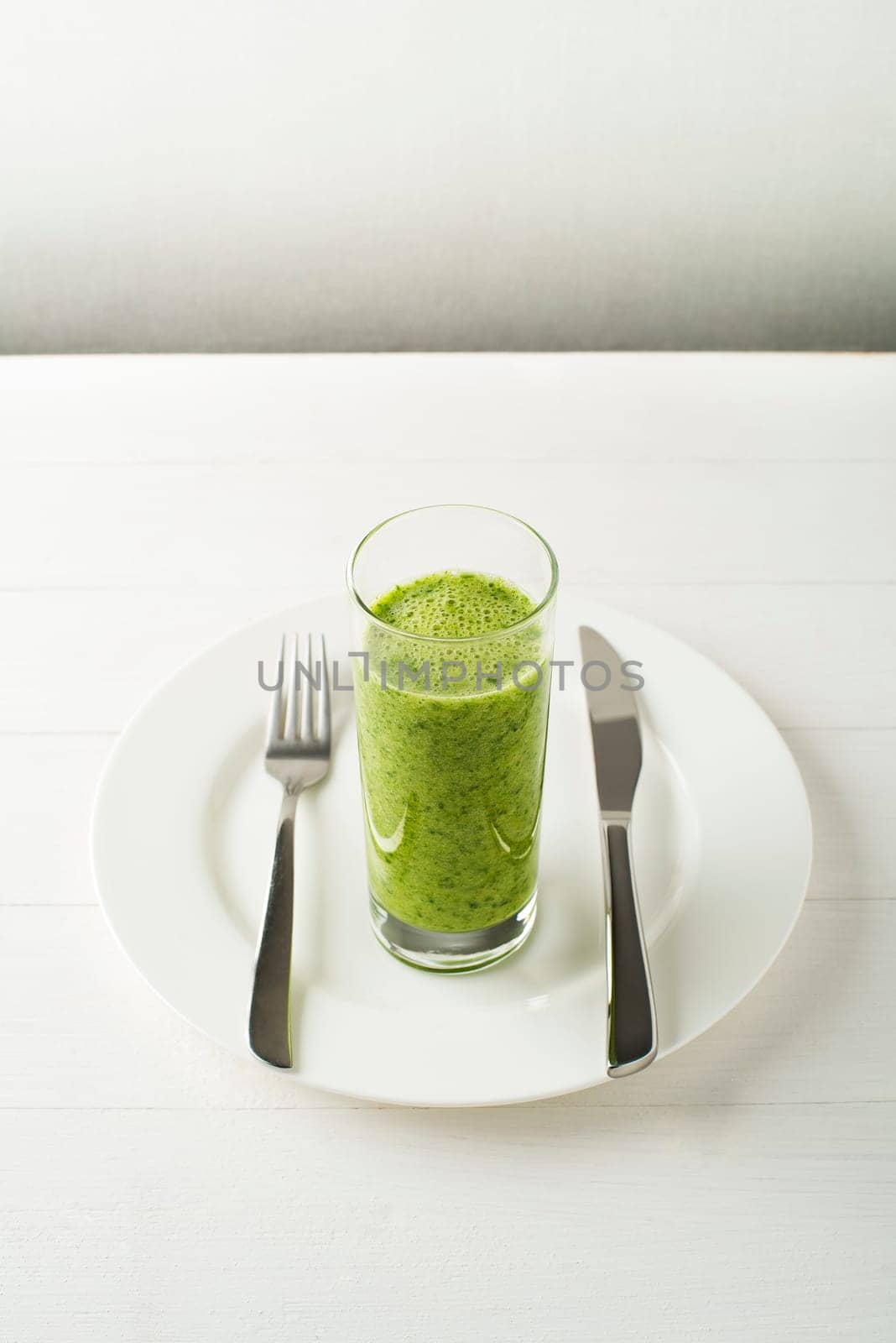 Glass of Healthy green smoothie with vegetables