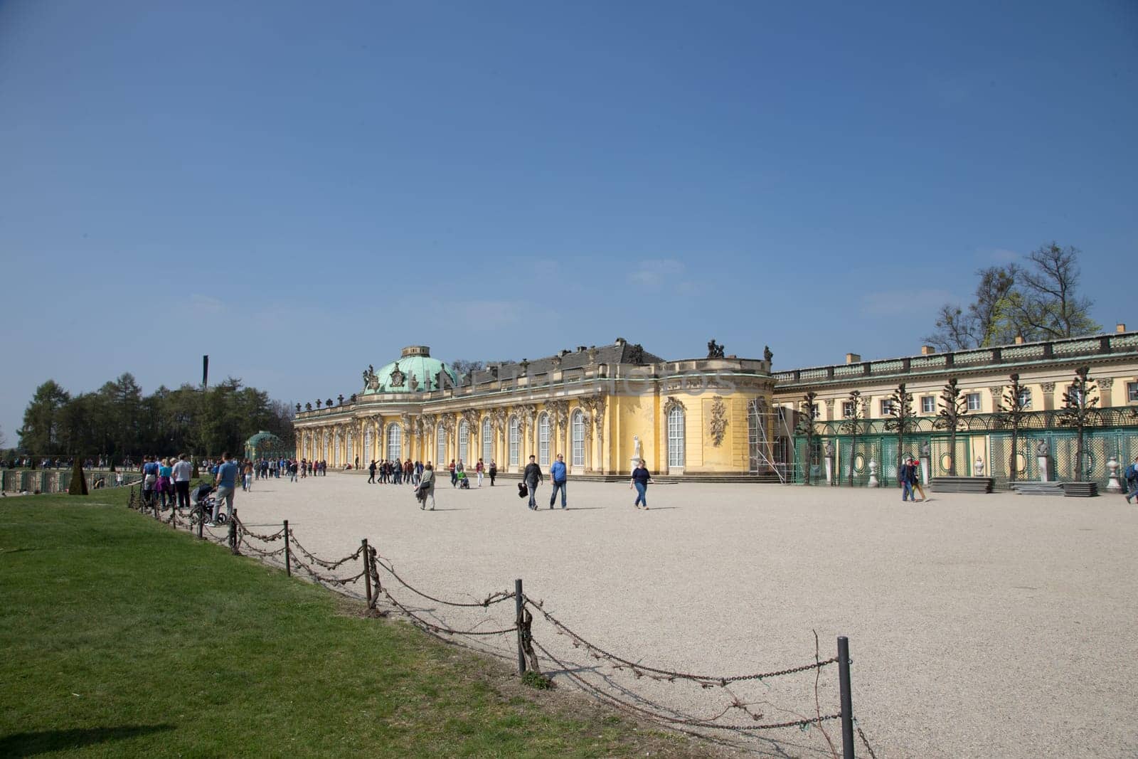 Sans Souci Palace in Potsdam with passers-by and tourists