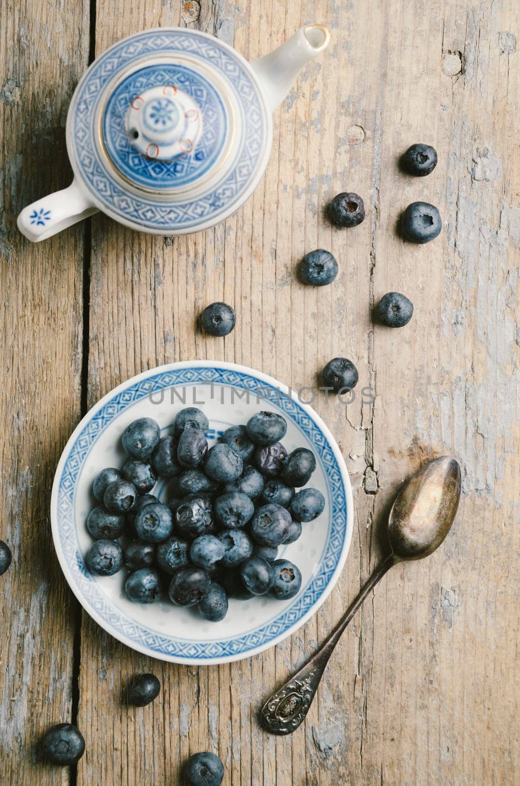Blueberries on rustic wooden table