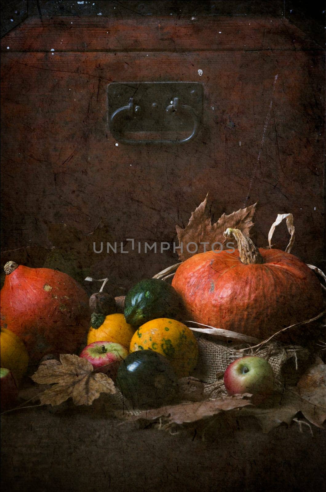 Still life with pumpkins and autumn leaves. Texture added.