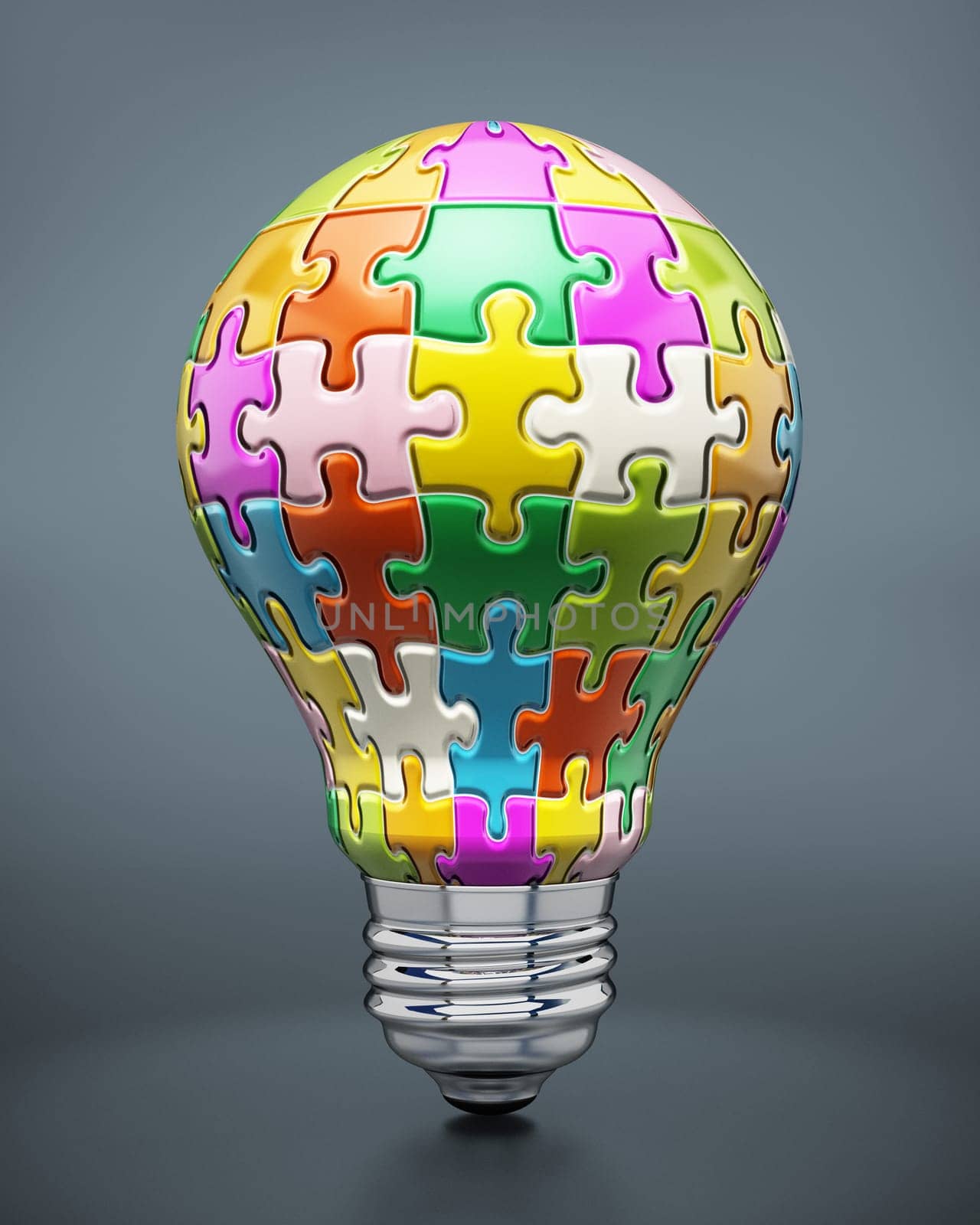 Colorful puzzle pieces forming a lightbulb.