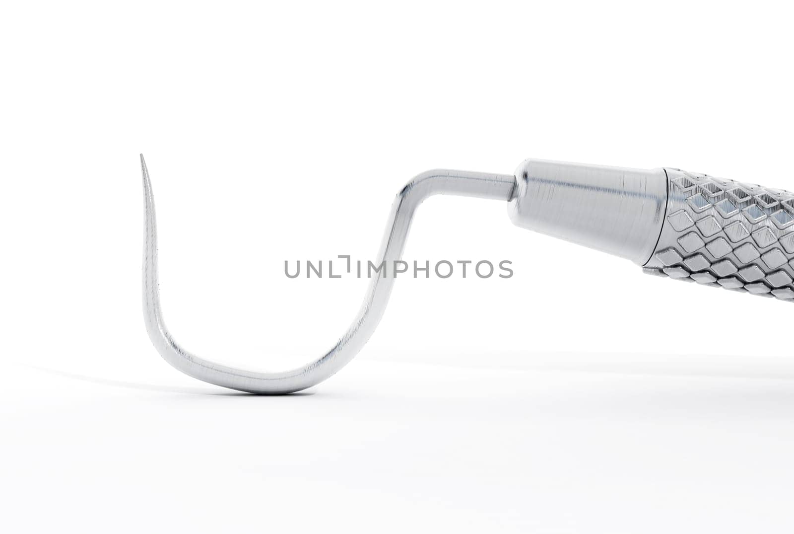 Dentist tool isolated on white background.