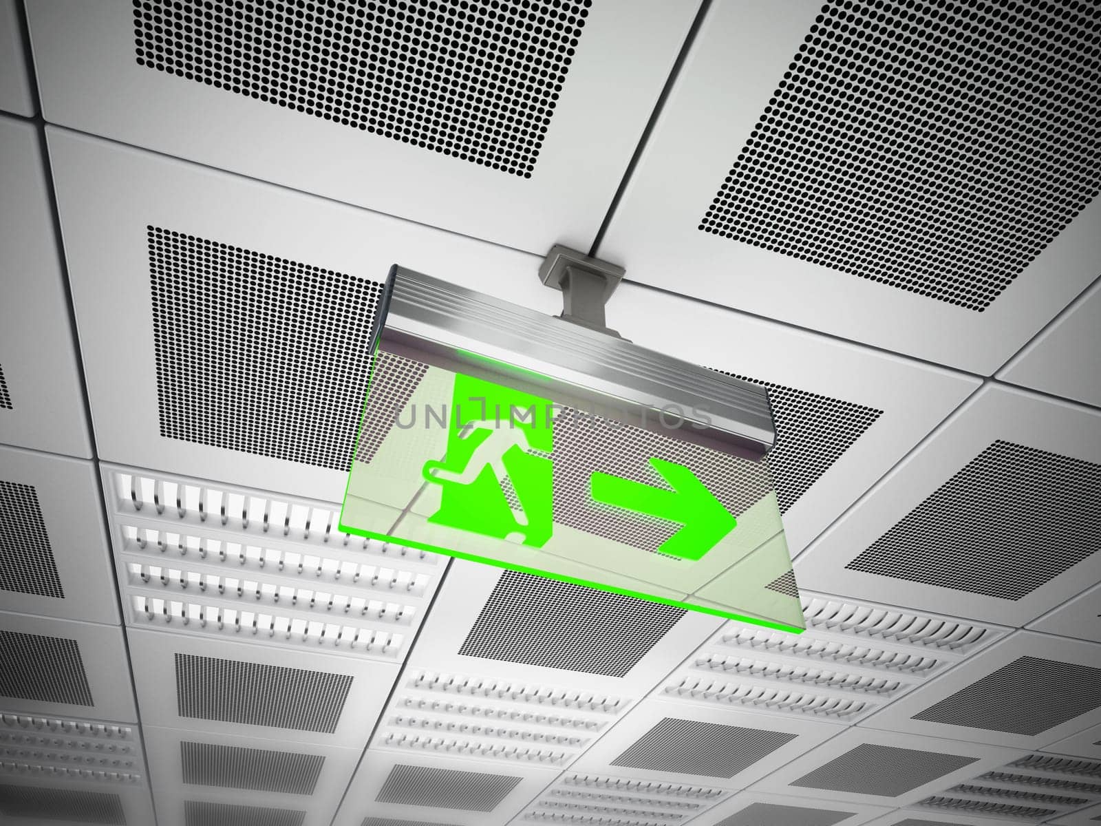 Exit sign hanging on suspended ceiling.