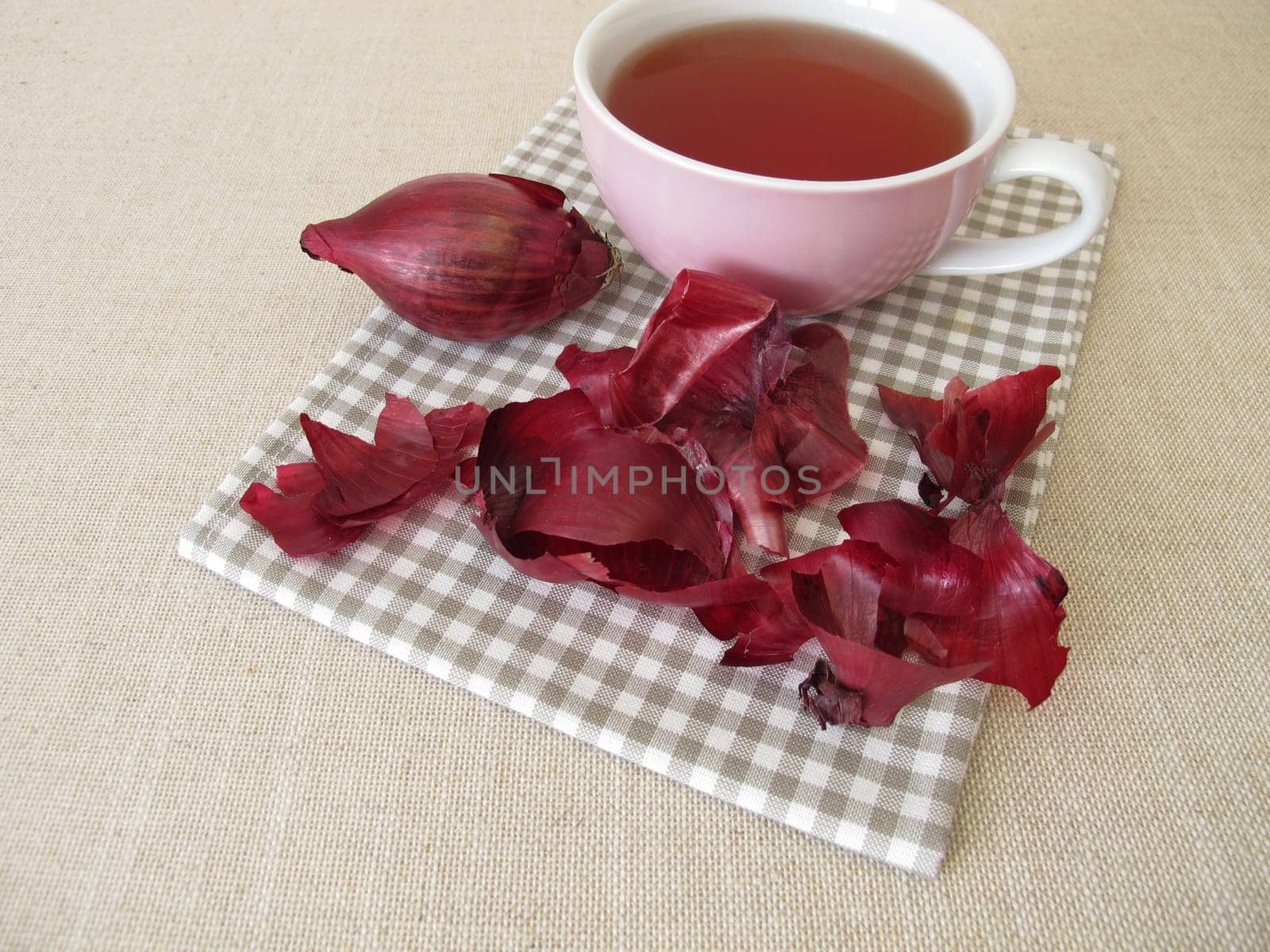 A cup of red onion peel tea