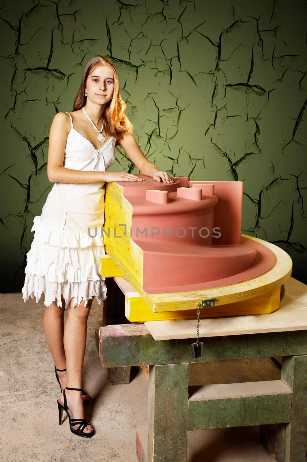 Woman with the wooden model