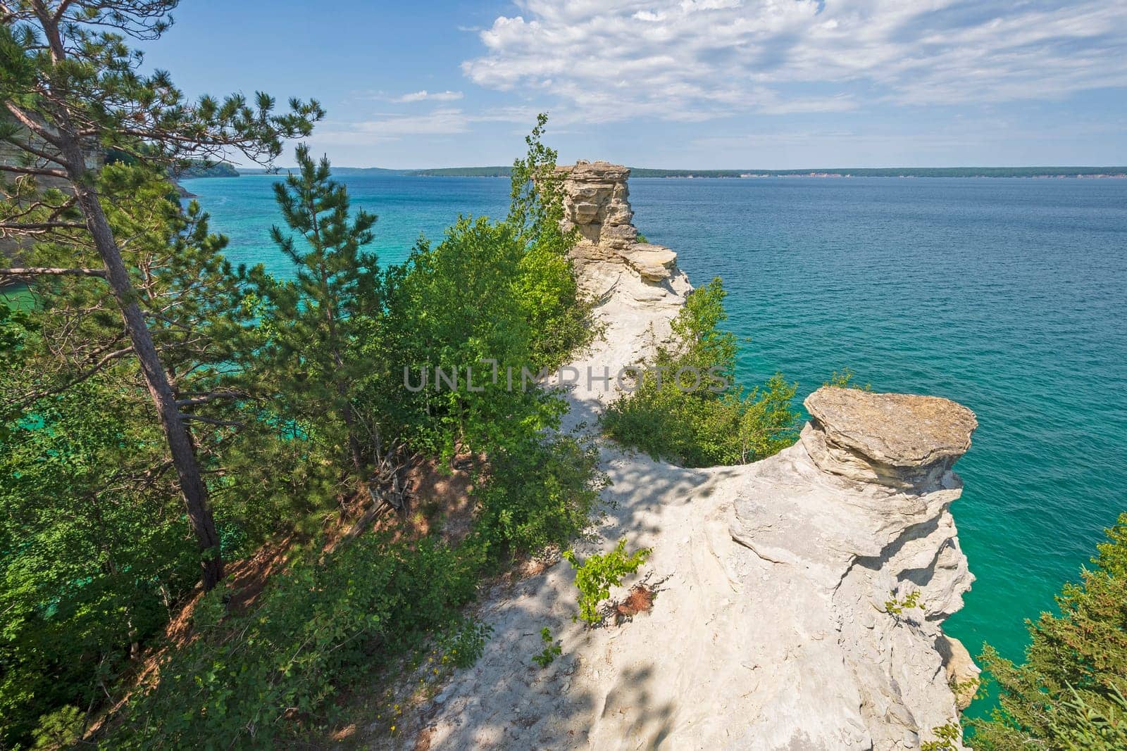 Sandstone Crags Over a Blue Lake at the Miners Castle in Pictured Rocks National Lakeshore in Michigan