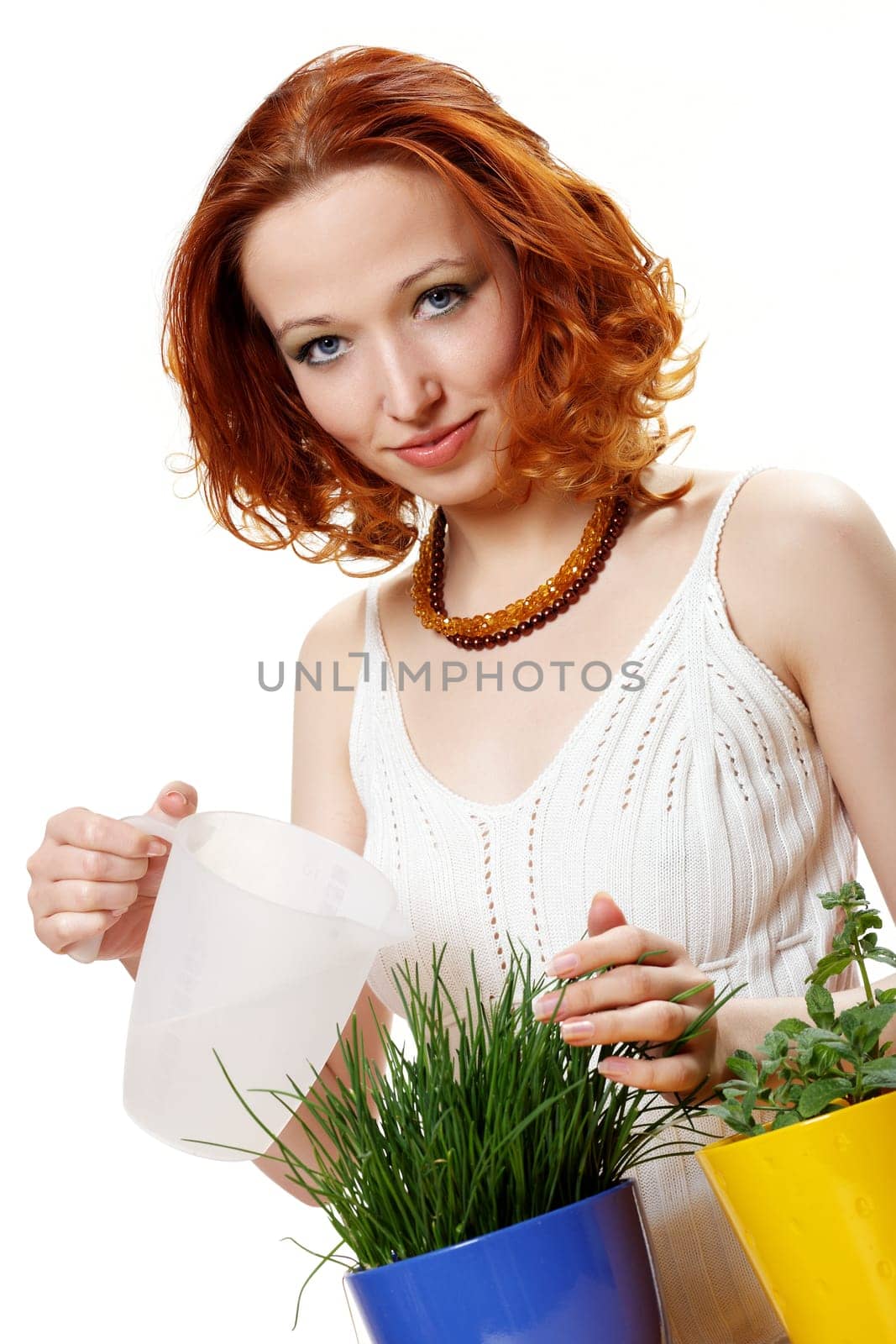 Young woman watered chives II.