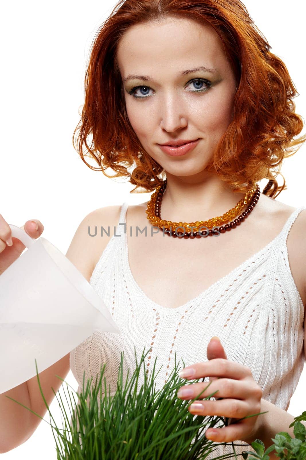 Young woman watered chives I.