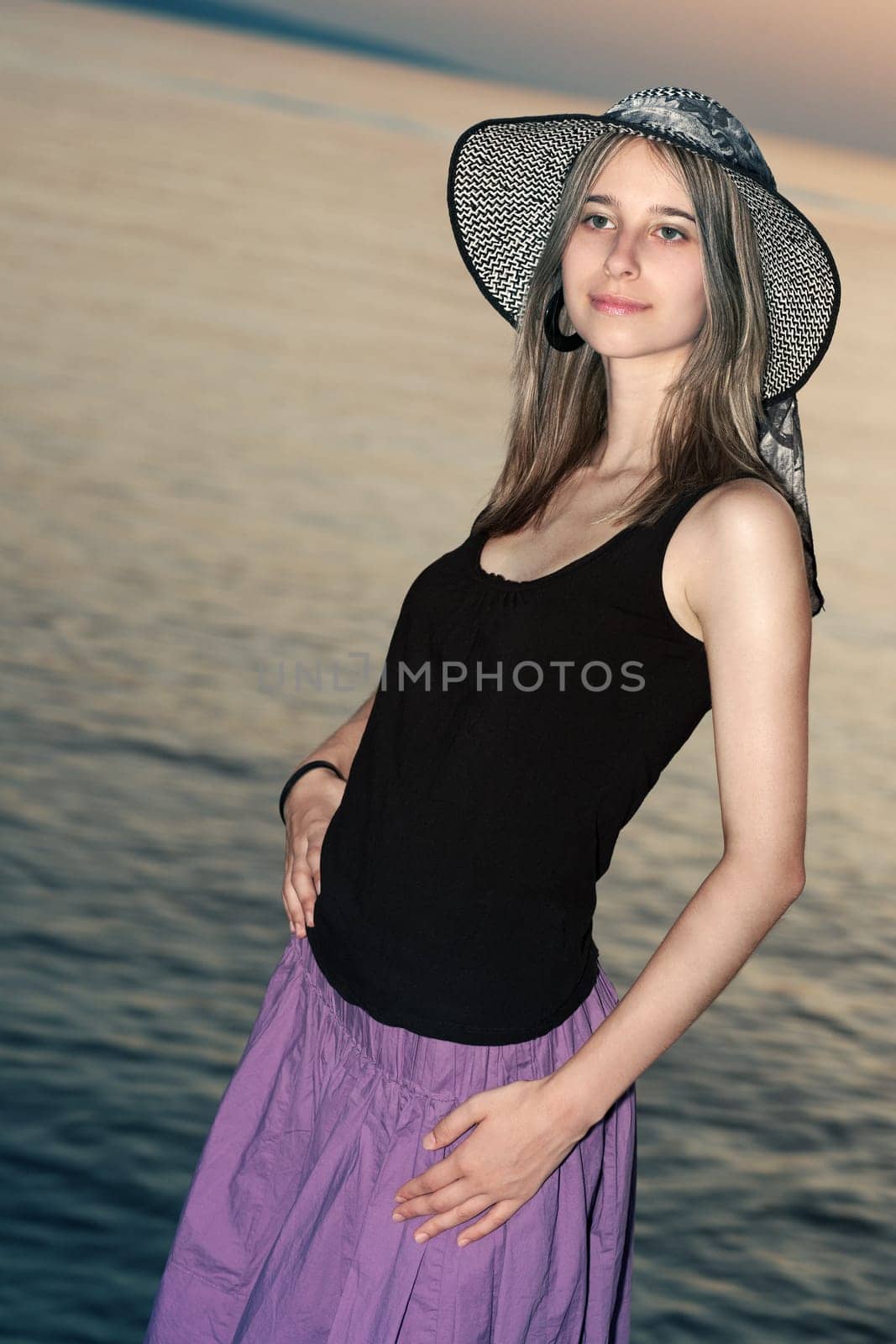 Posing by the sea