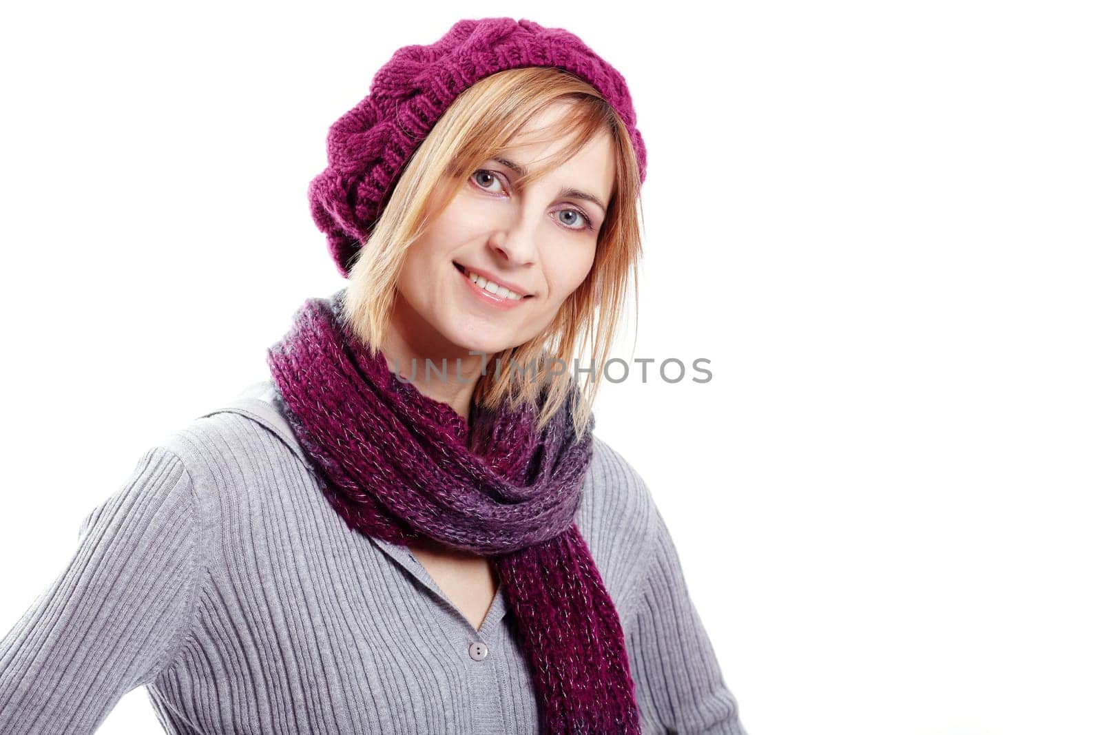 Blonde woman in pink cap