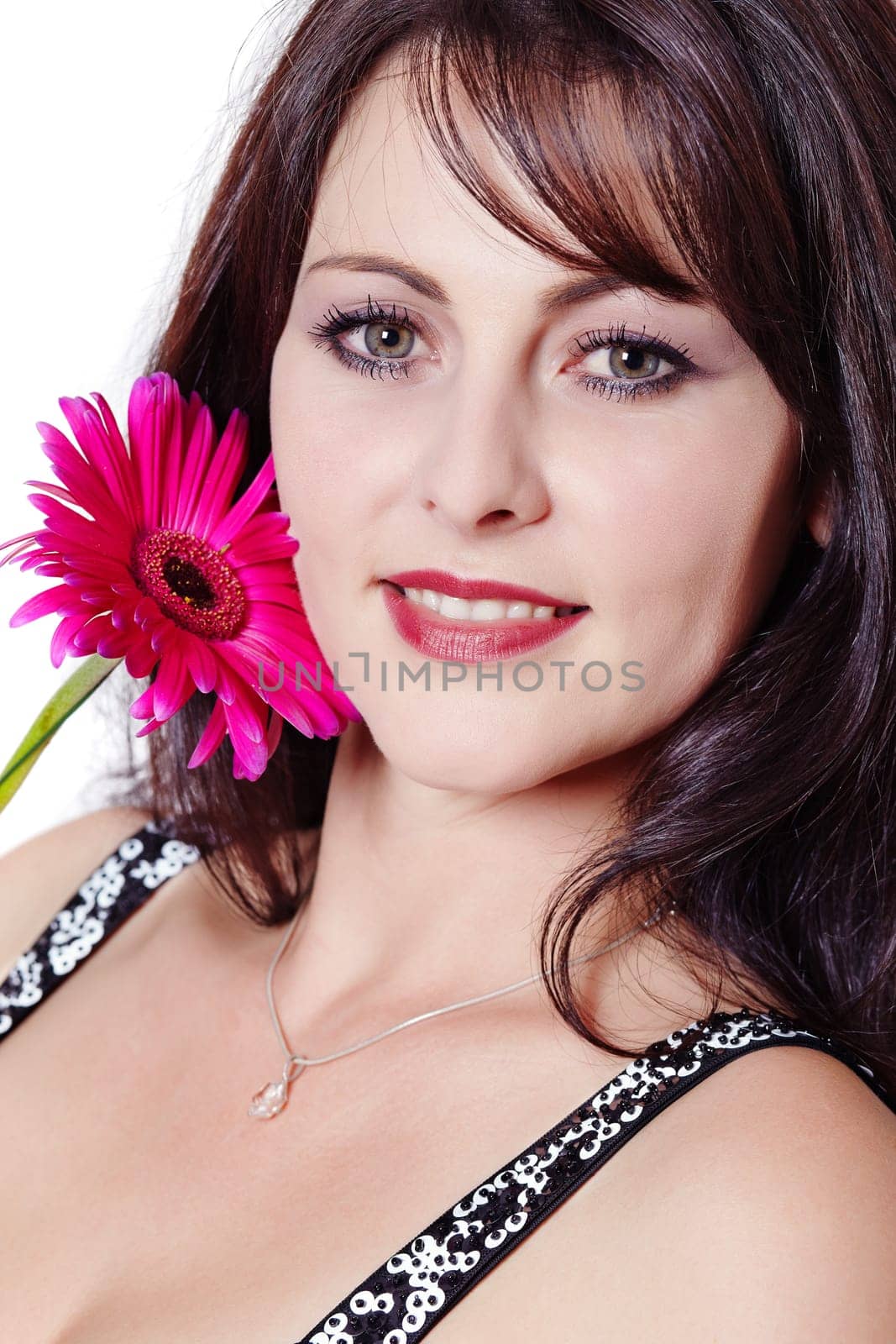 Brown-haired woman with gerbera I.