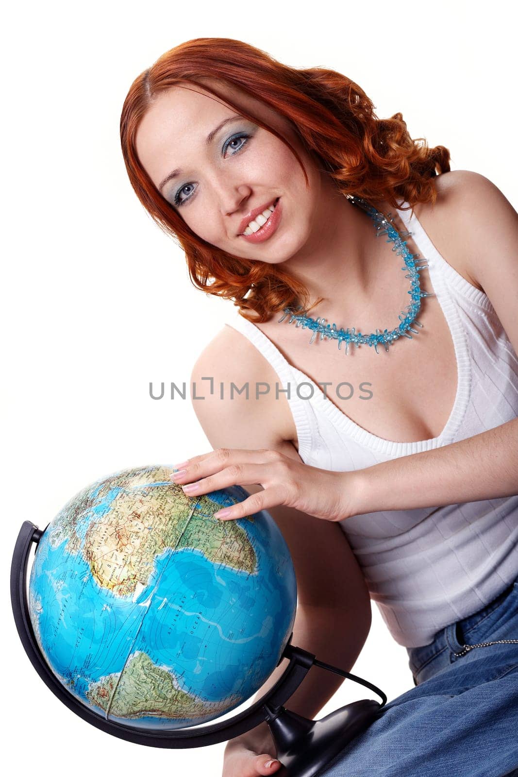 Woman pointing on the globe