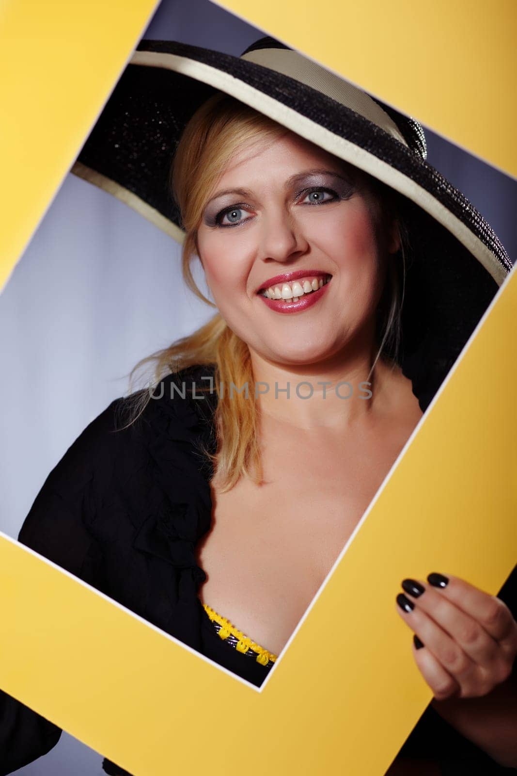 Woman behind the picture