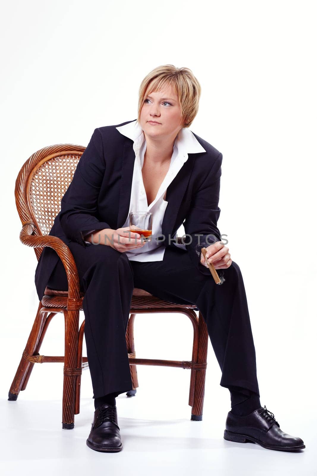 Woman with whiskey and cigar