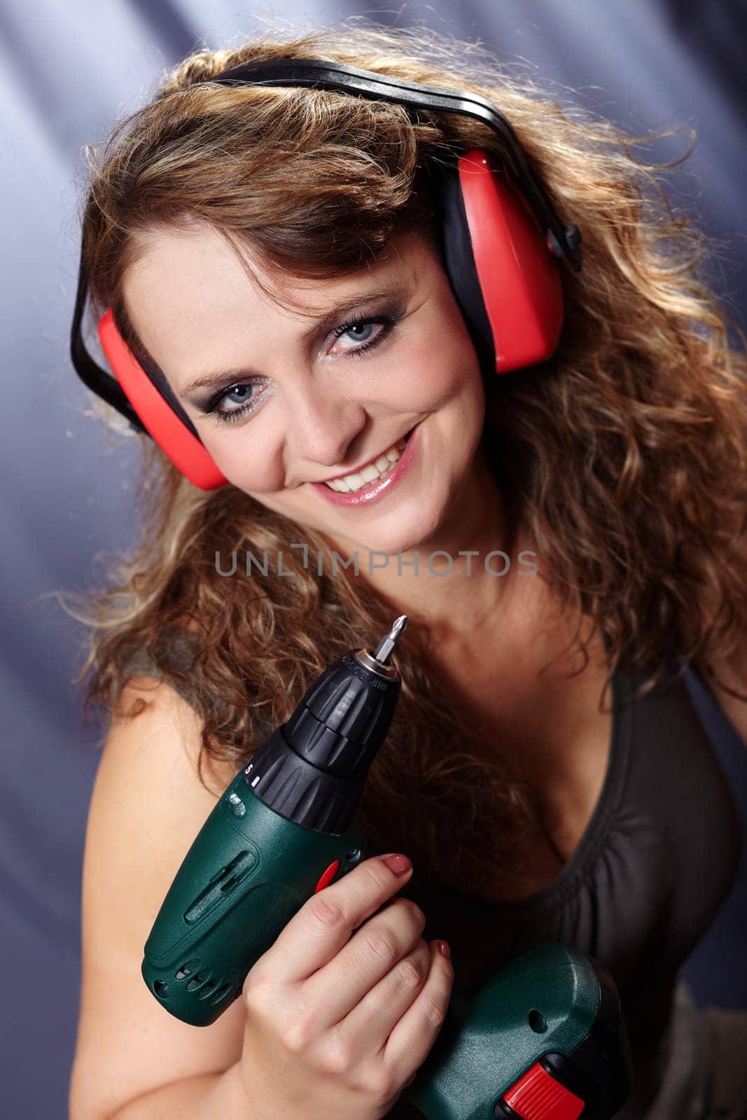 Woman with the acuum screwdriver I.