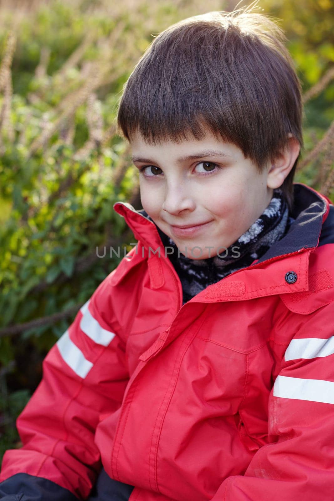 Boy in red jacket