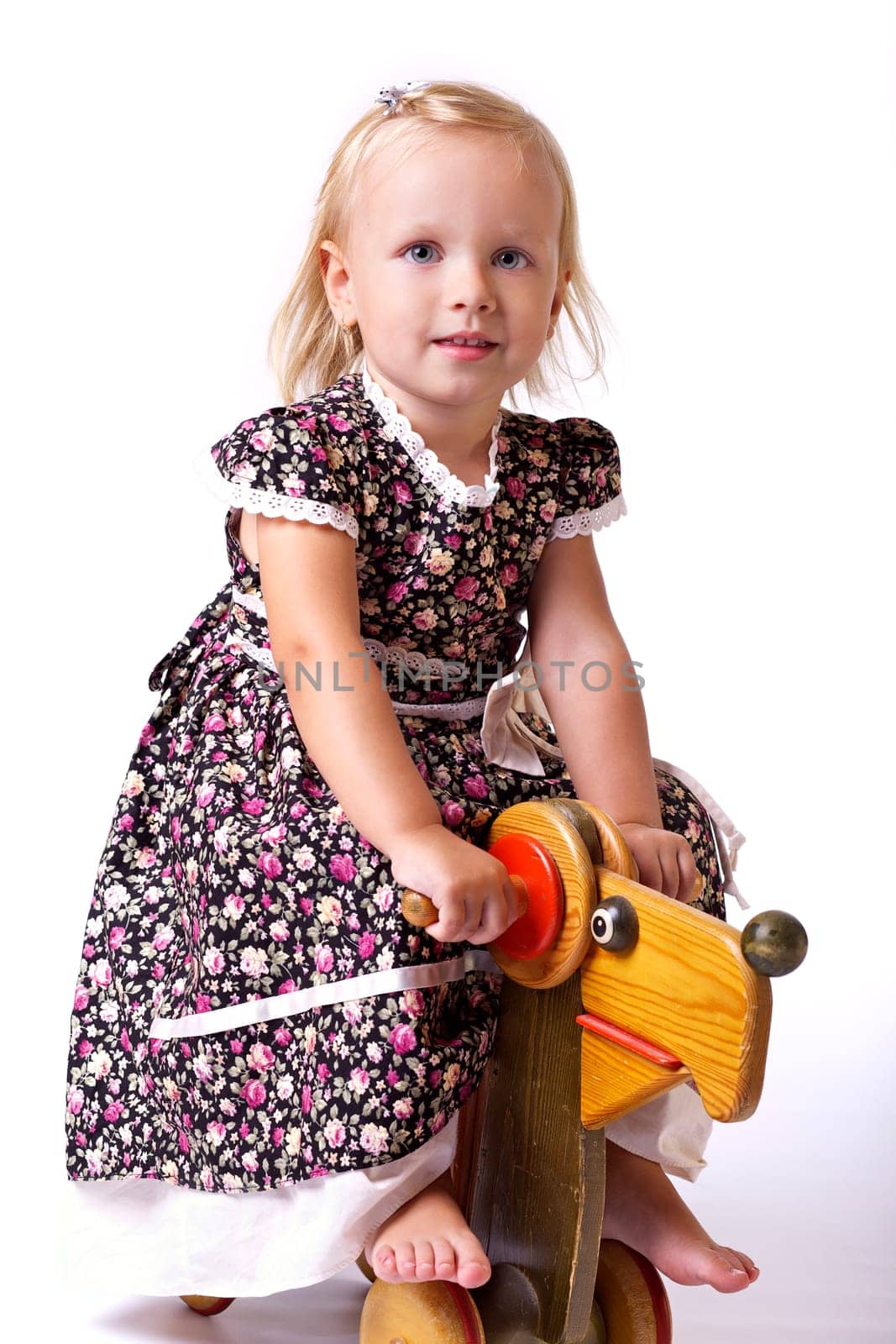 GIrl driving toy car