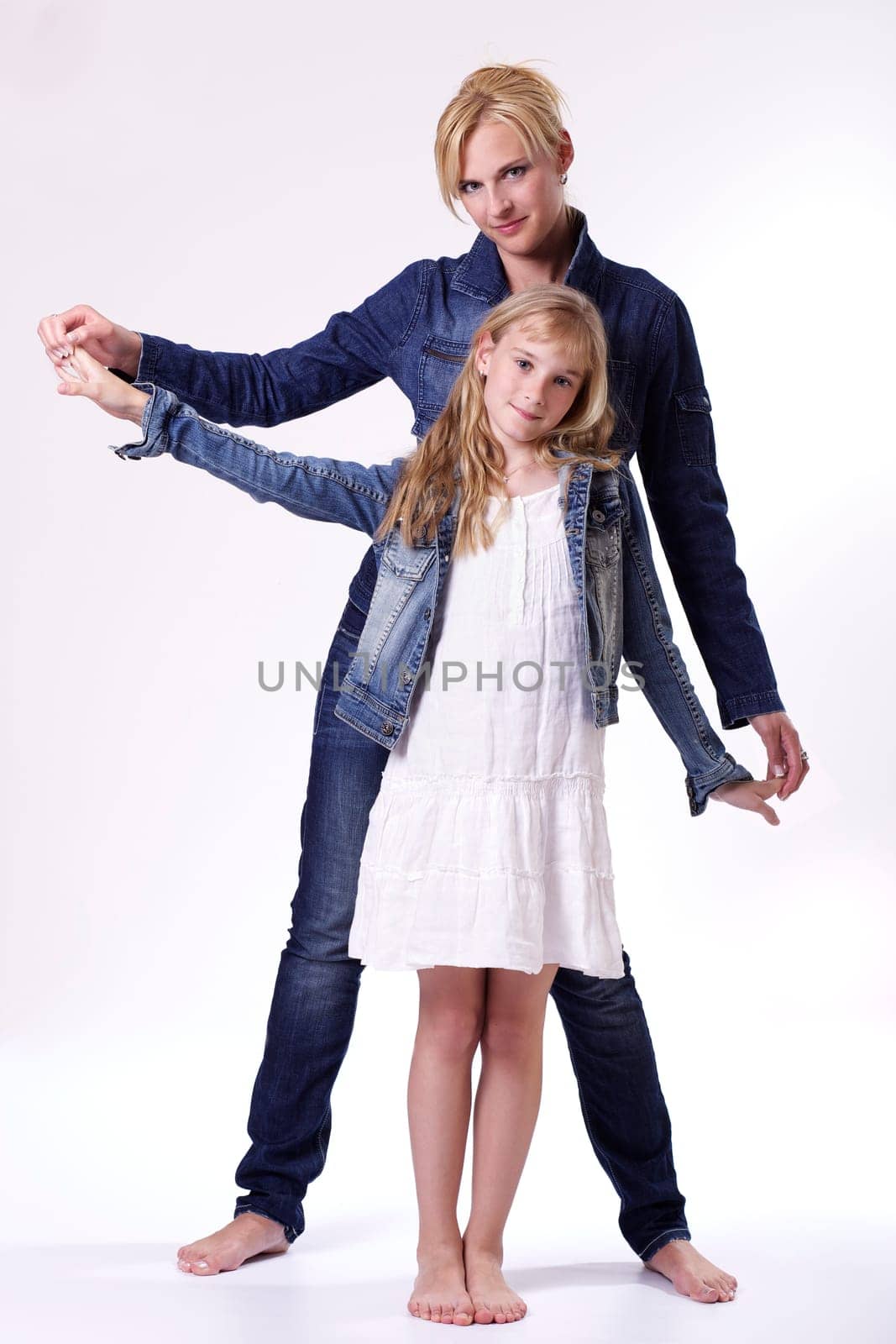 Mother and daughter dressed in jeans I