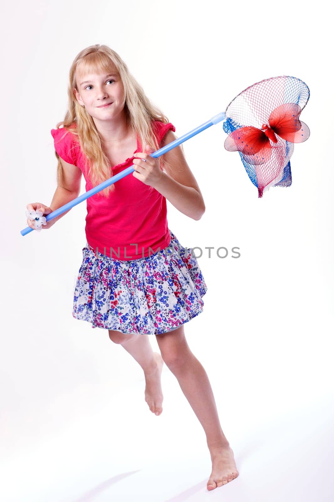 Girl catching butterfly I