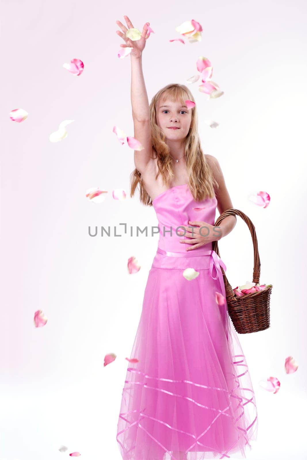 Pretty girl throwing flower