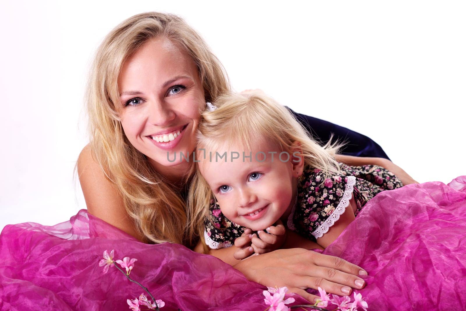 Young mother playing with daughter II