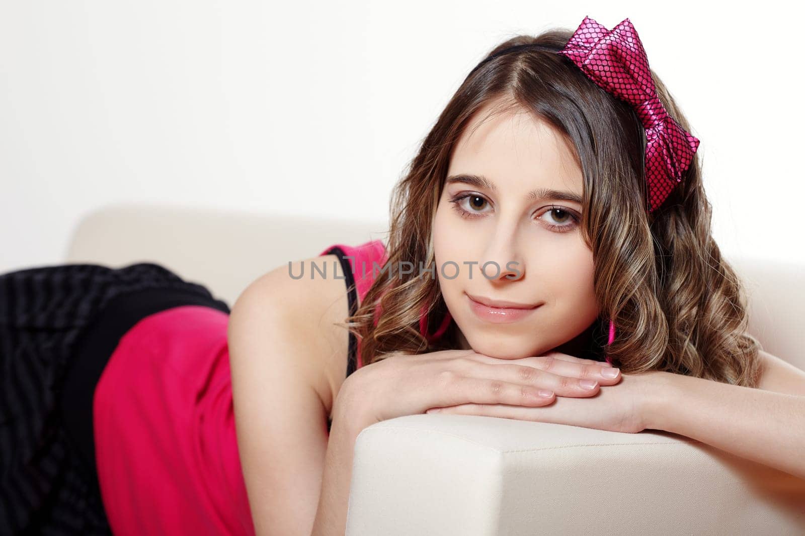 Young woman lying on a sofa