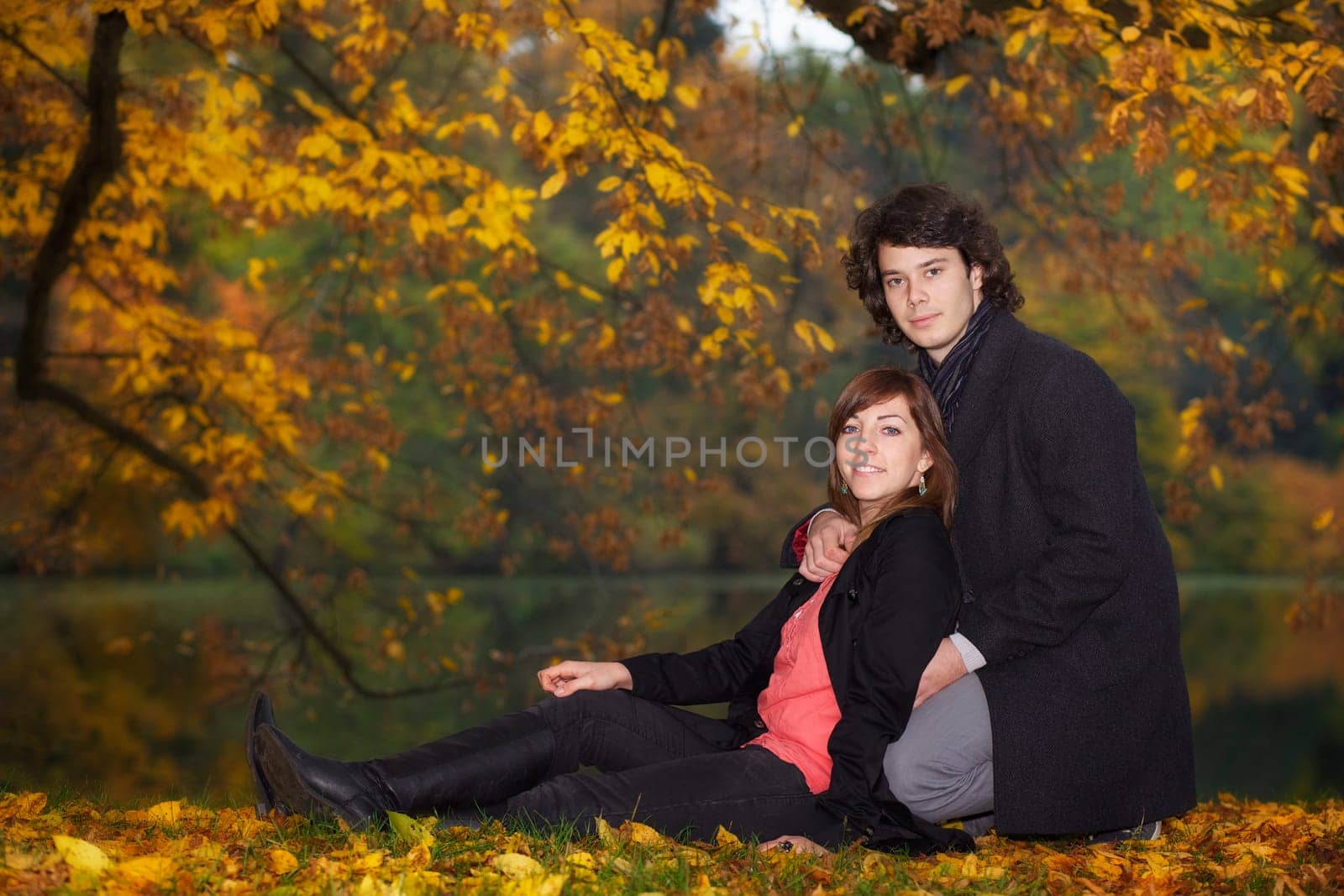 Young couple sitting in a park