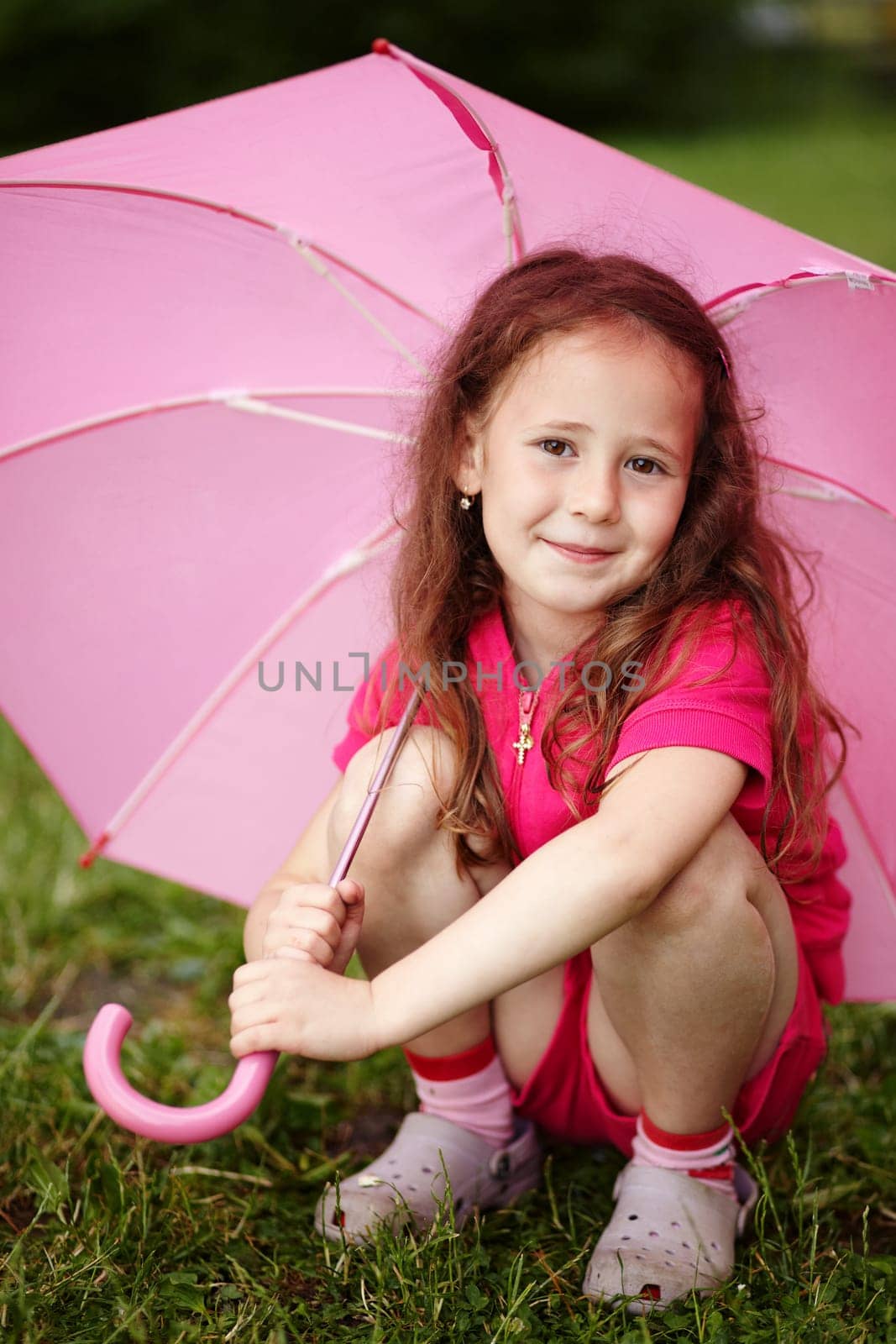 Portrait of a girl holding an umbrella