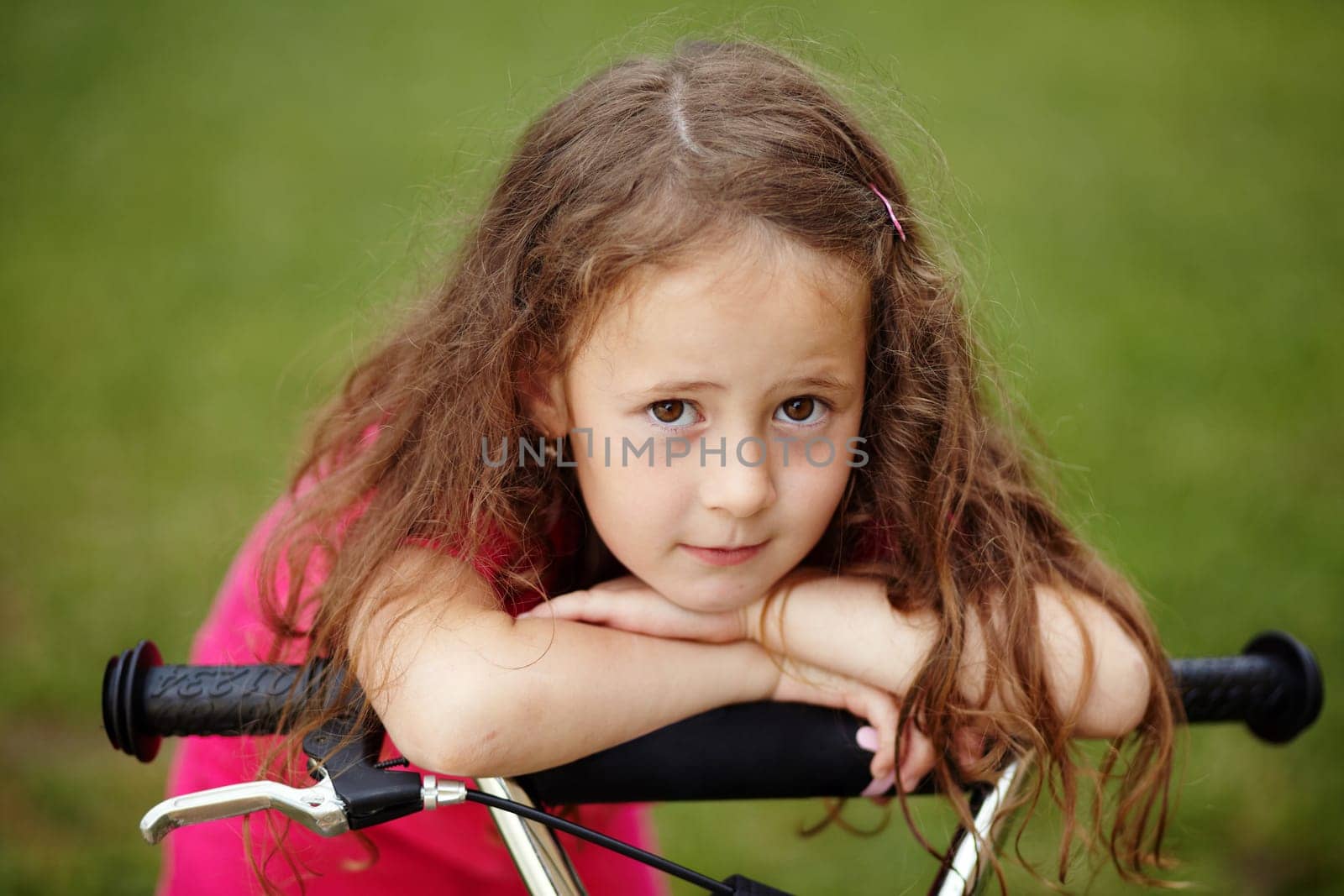 Portrait of a girl with a scooter
