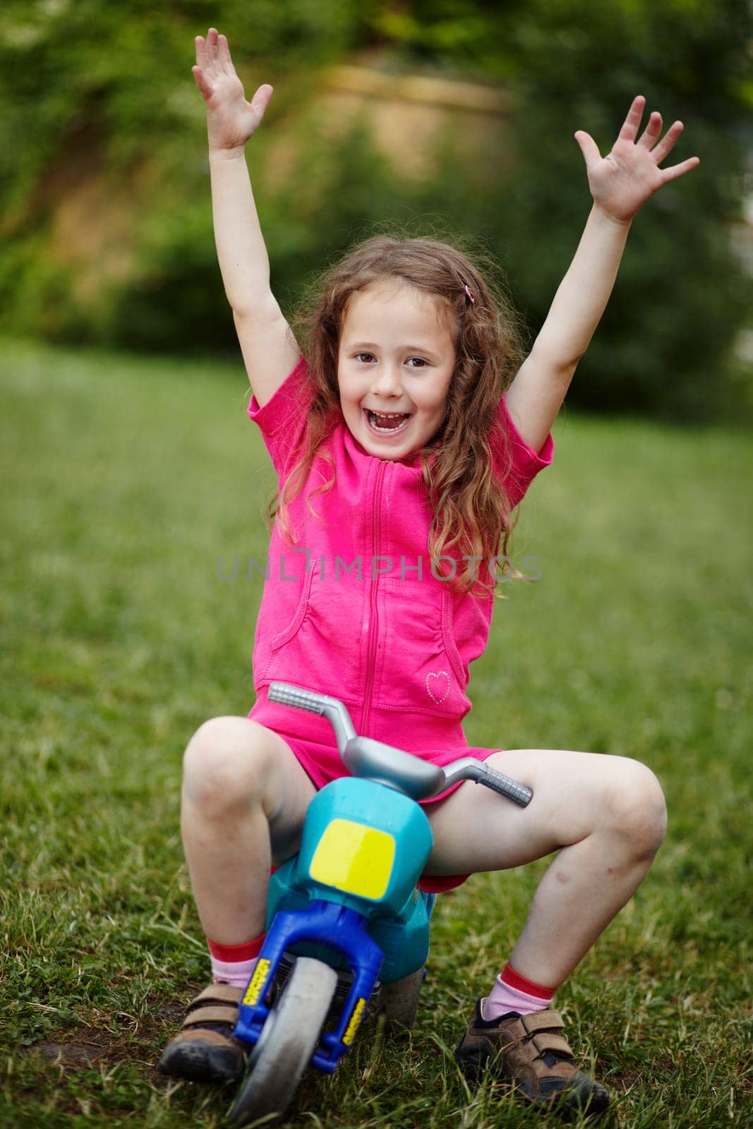 Portrait of a girl with a motorbike