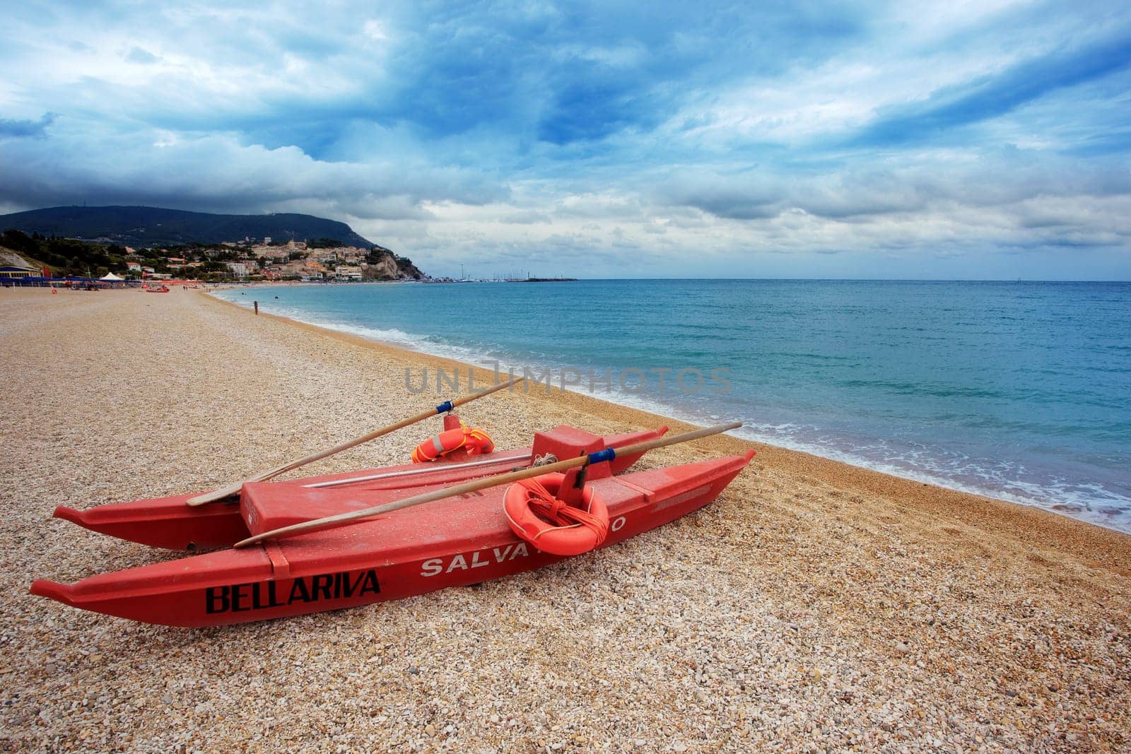 A beach with a watercraft