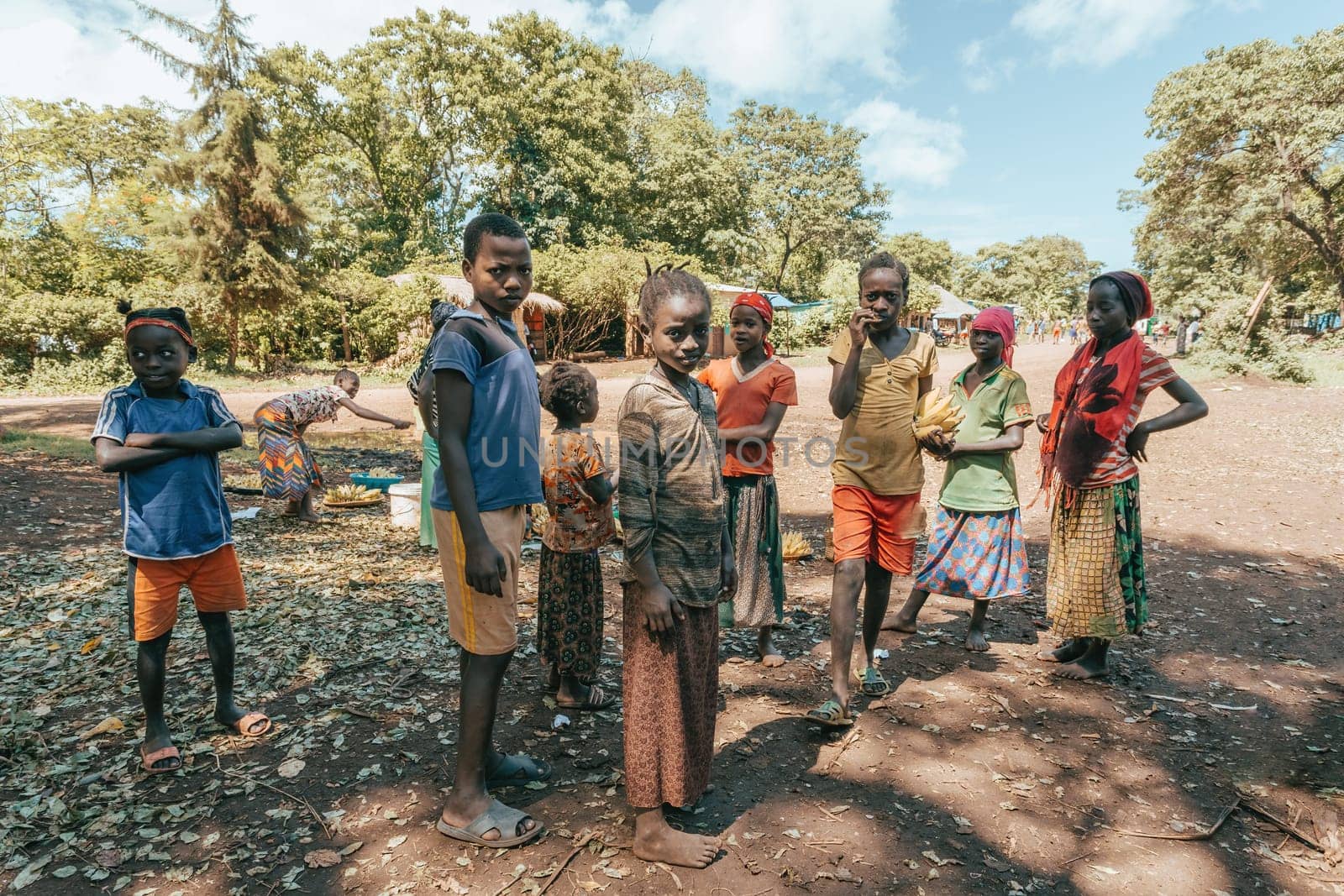 Cure - Jinka, Omo River Valley, Ethiopia - May 10, 2019: portrait of happy teenagers in Cure near city Jinka, southwestern Ethiopia. Africa