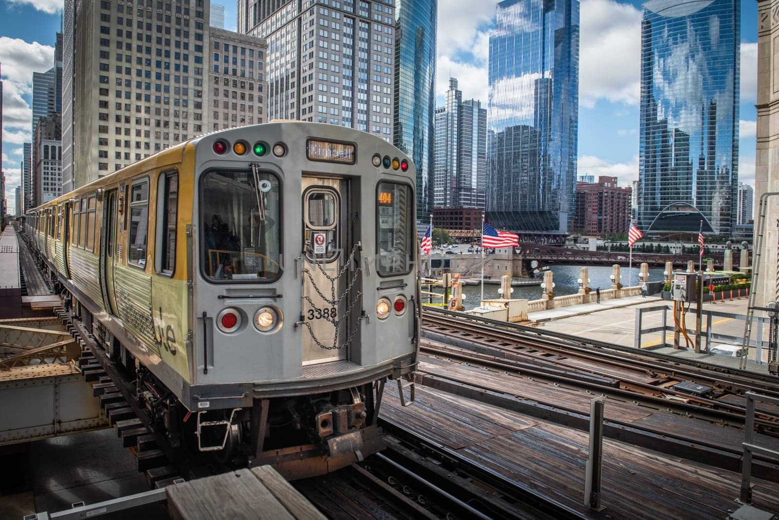 Chicago, Illinois, United States of America : October 11, 2018, Train on elevated tracks within buildings at the Loop, Glass and Steel bridge between buildings - Chicago City Center - Chicago, Illinois, USA