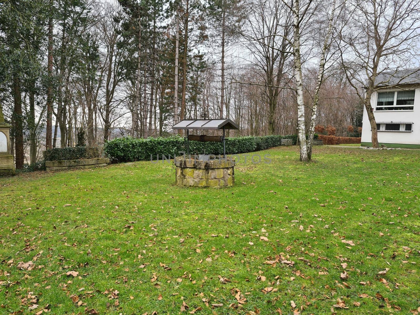 Ancient draw-well in European village