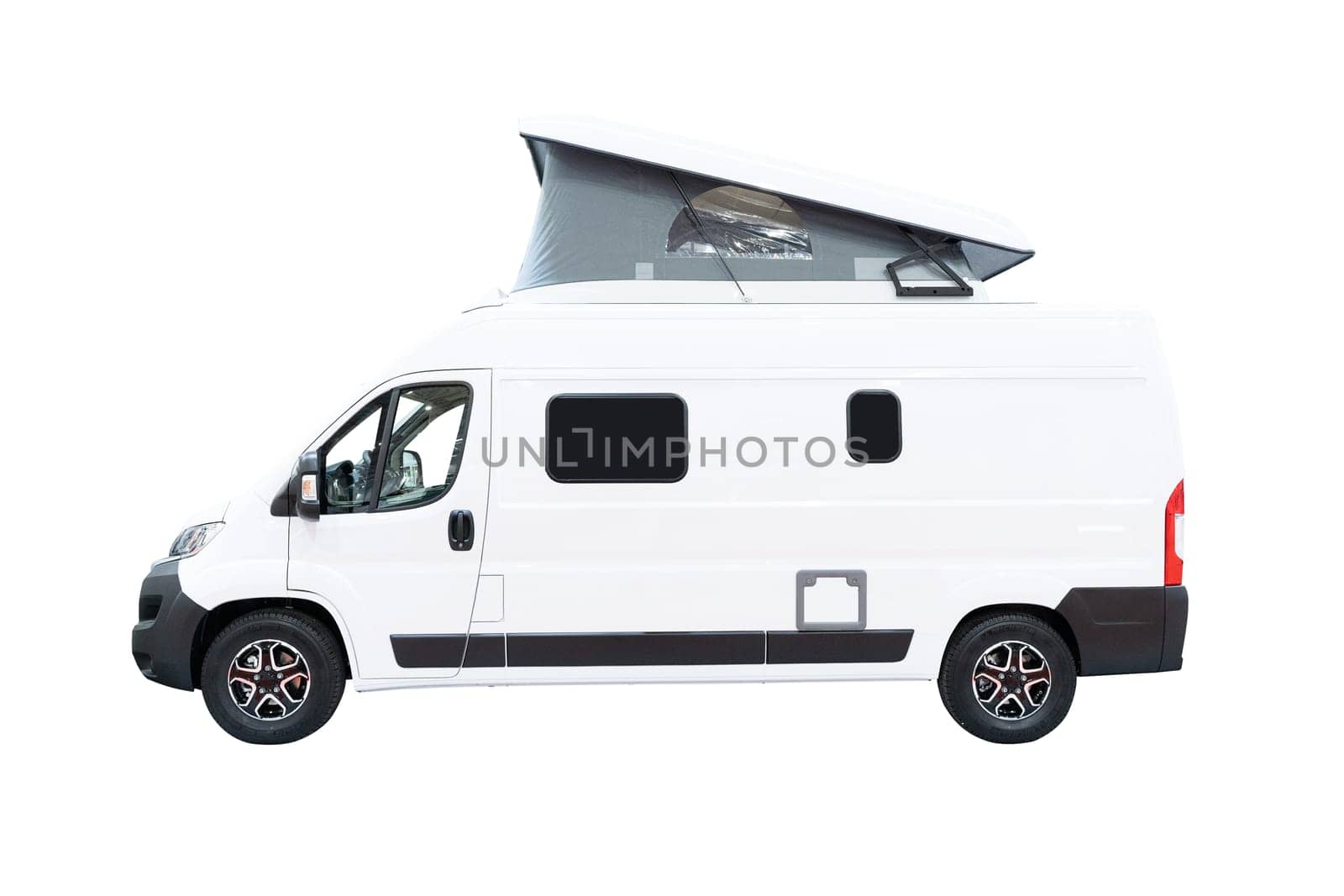 side view of white campervan RV motorhome with open camping tent on top isolated on background