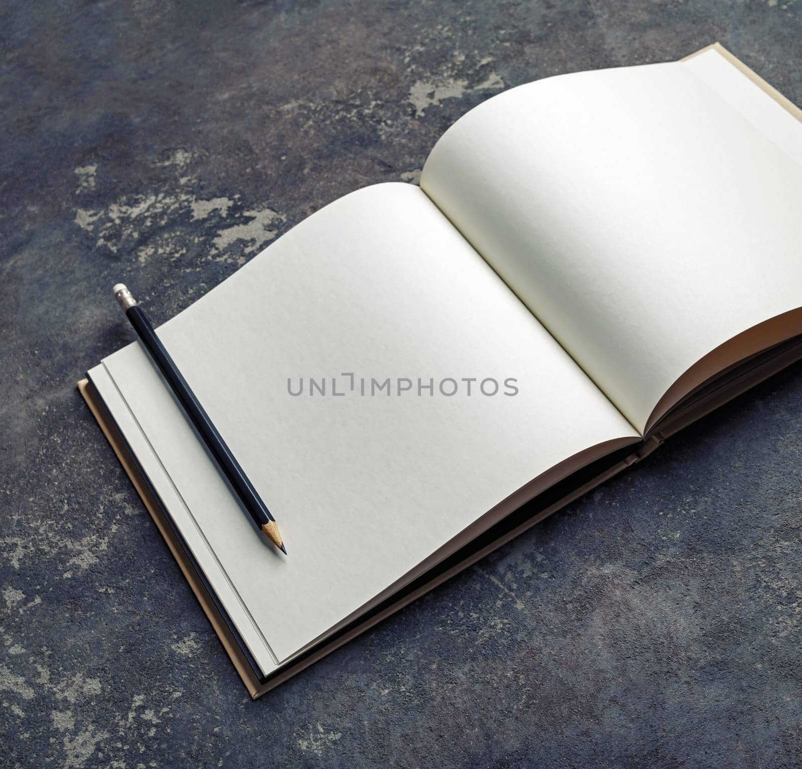 Mockup of opened blank brochure on concrete background.