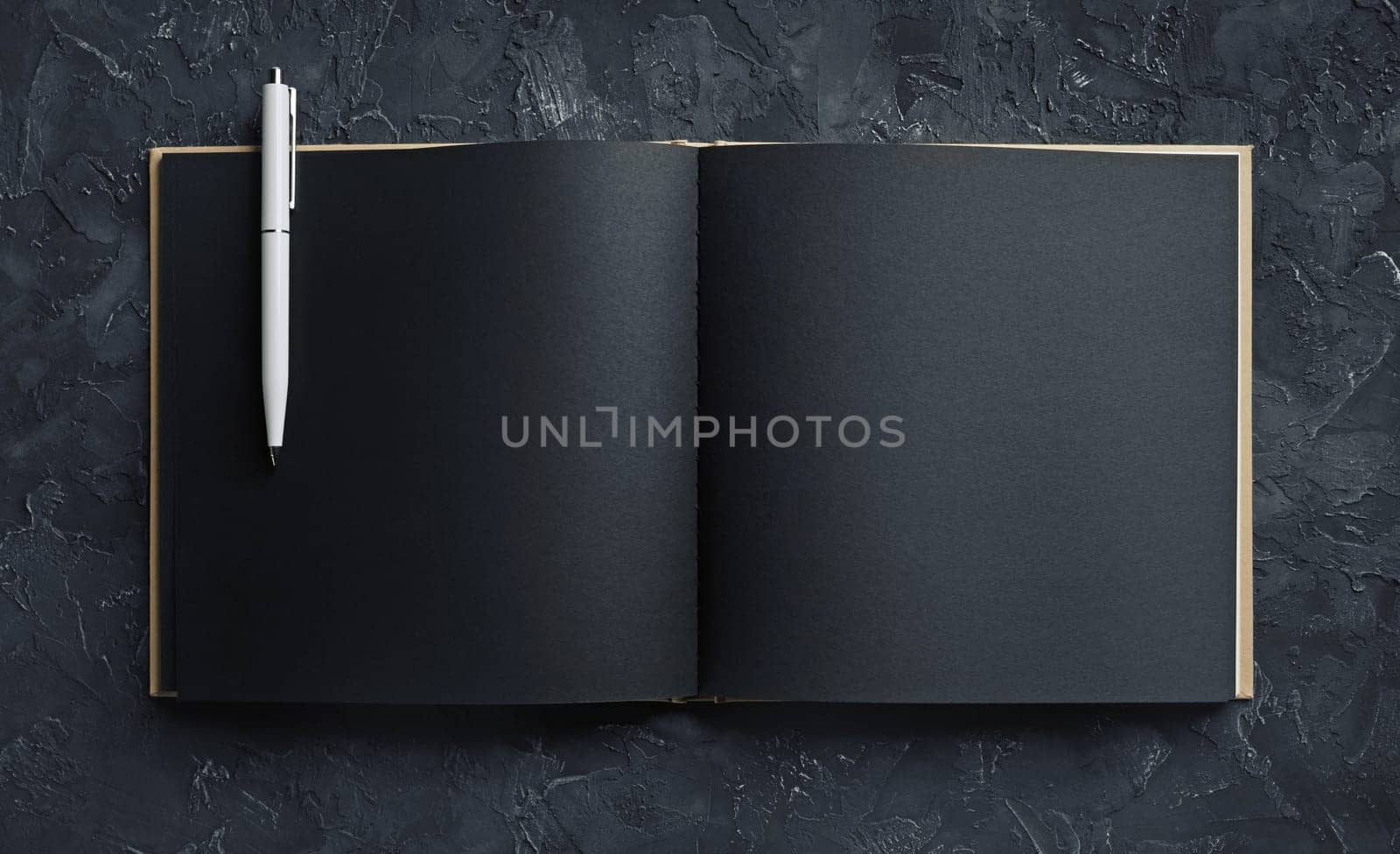 Blank black open sketchbook and pencil. Responsive design template. Top view.