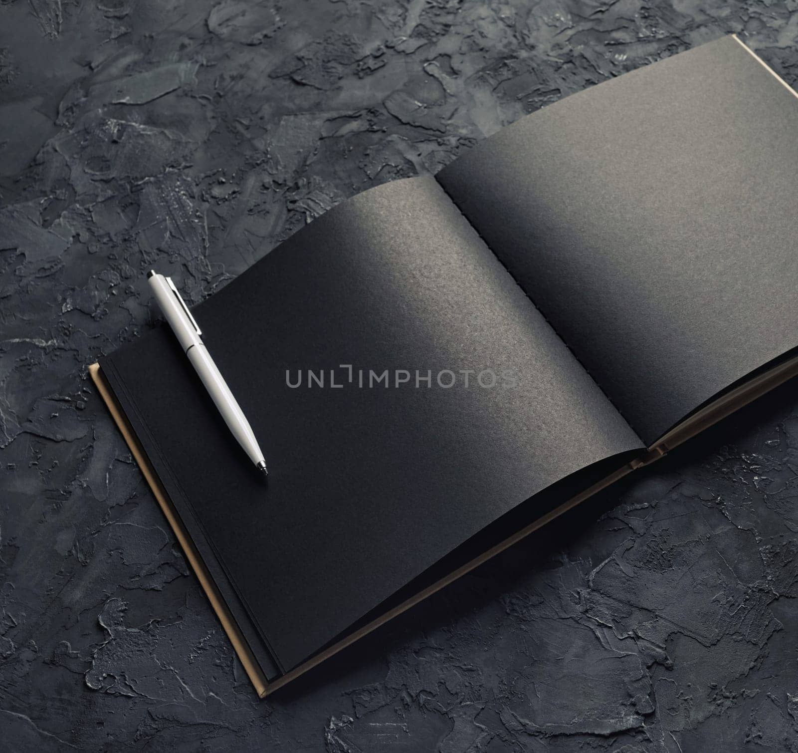 Blank black booklet and pen mock up. Template for placing your design.