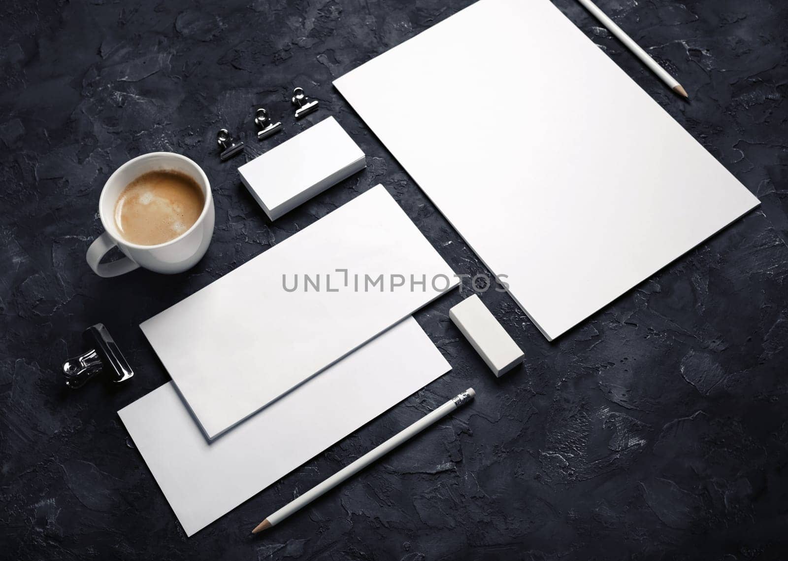 Corporate identity template. Branding mock up. Blank business stationery mock-up on black plaster background.