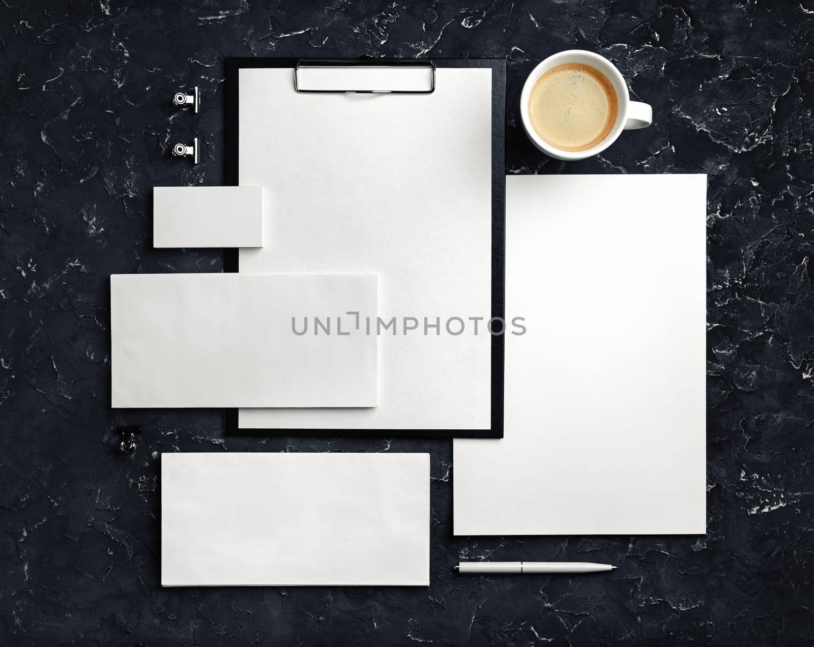 Blank corporate stationery set on black plaster background. Template for branding design. Branding mock up. Top view.