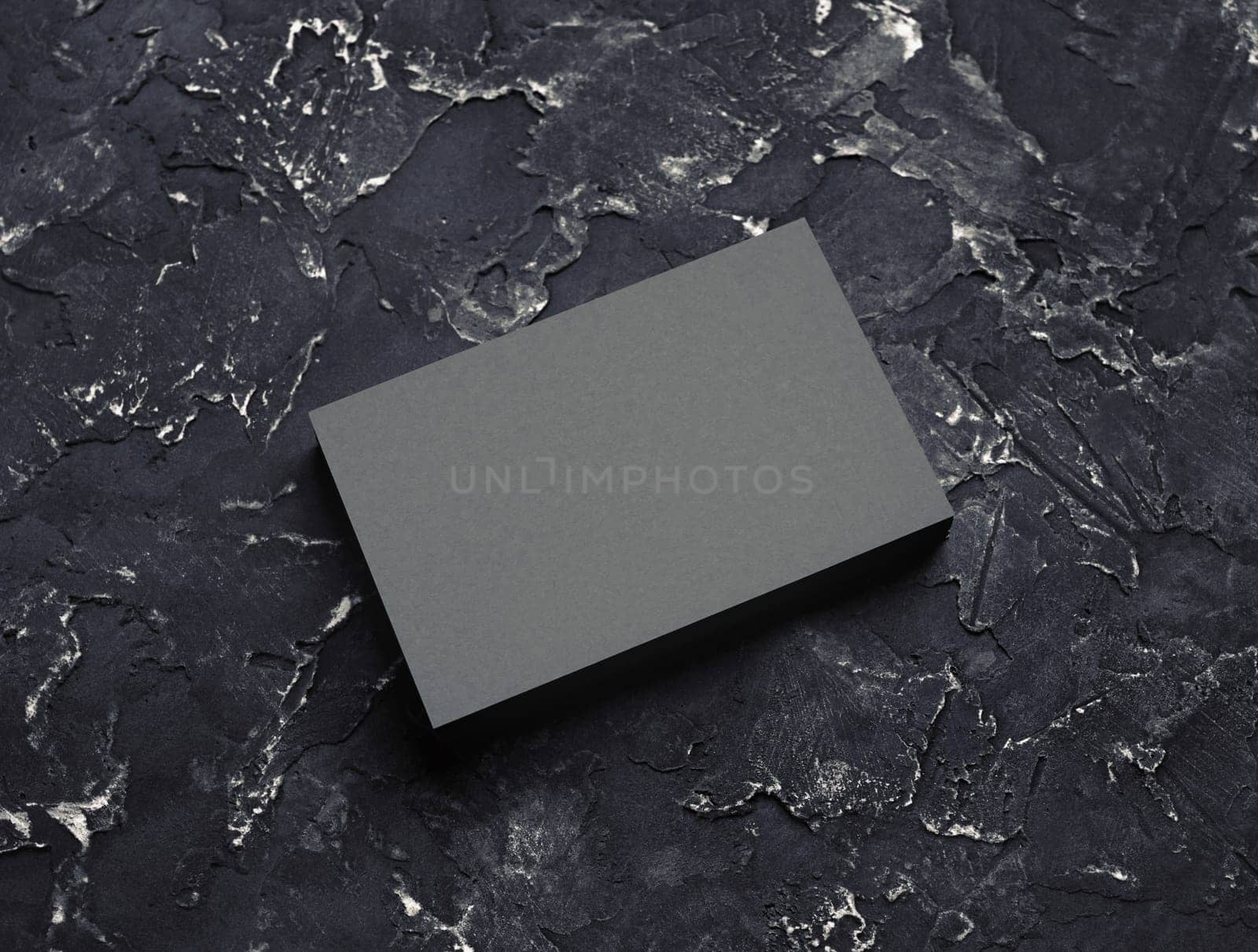 Blank grey business card mockup on black plaster background. Responsive design template.