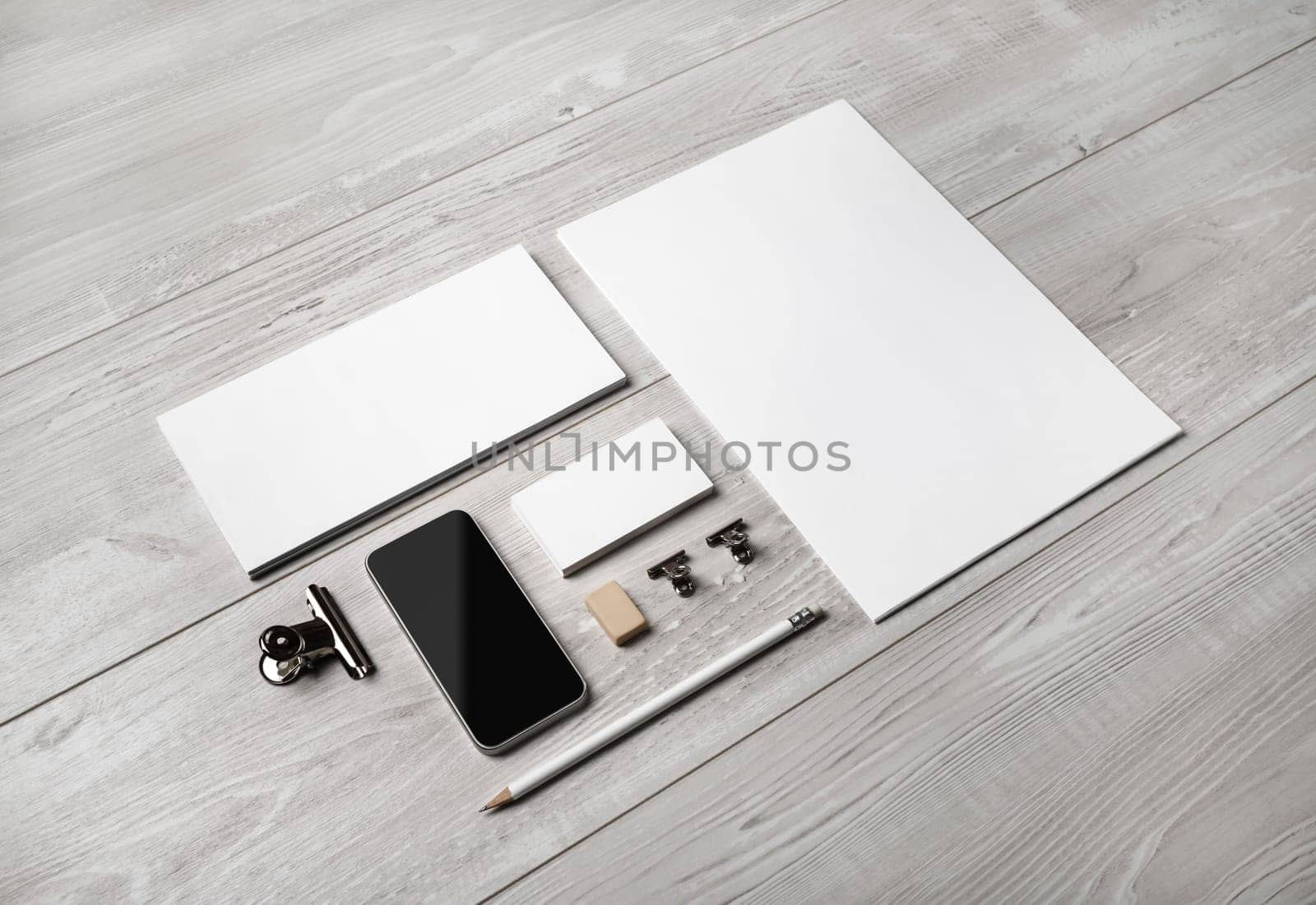Blank corporate stationery set on light wooden background. Template for branding design. Branding mock up.