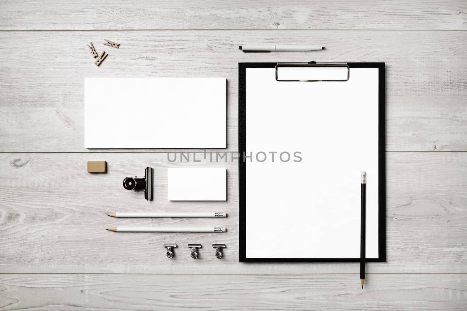 Blank stationery set on light wooden background. Template for branding identity. For graphic designers presentations and portfolios. Flat lay.