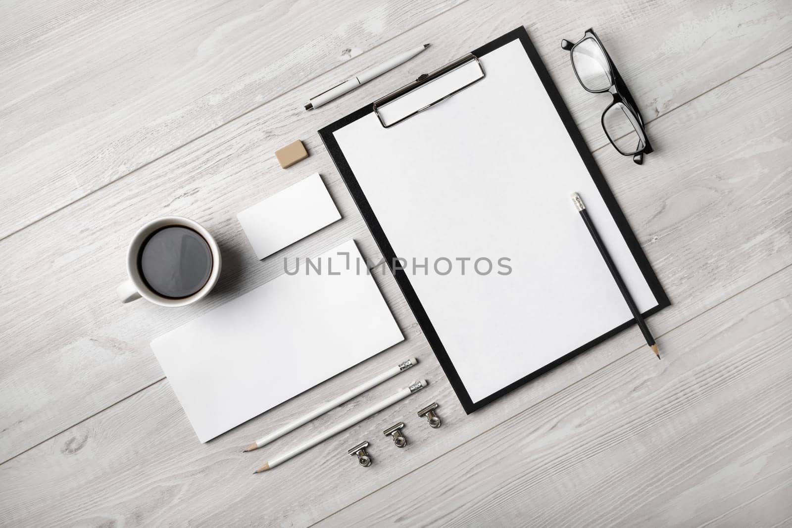 Branding stationery mockup on light wooden background. Blank objects for placing your design. Flat lay.