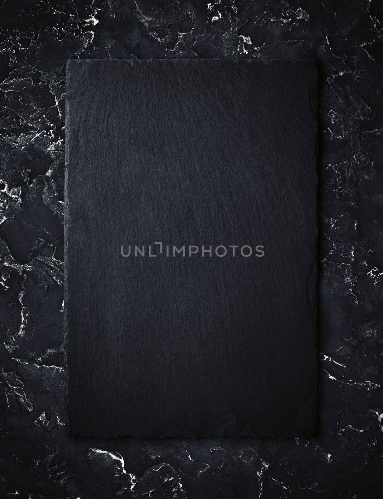 Blank black slate plate. Top view.