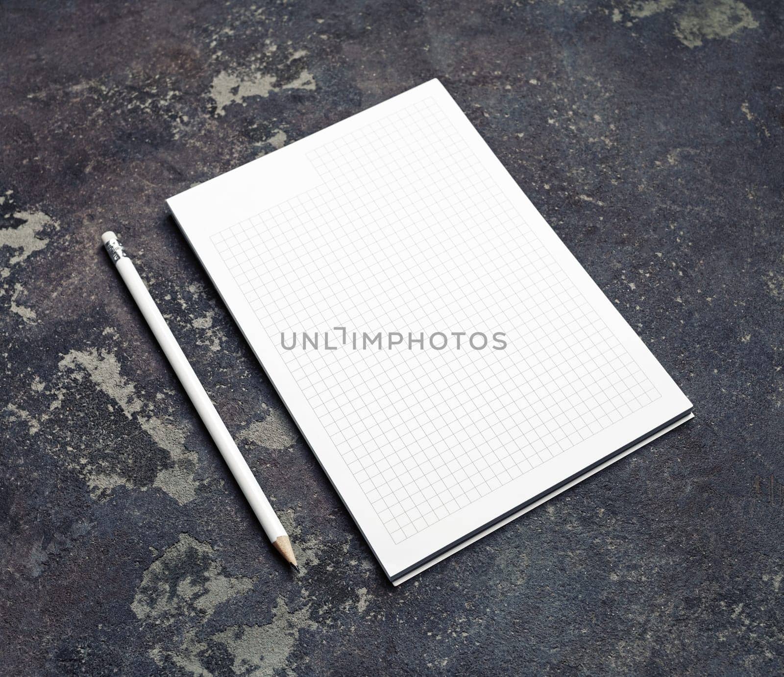 Branding stationery mockup. Copybook and pencil on concrete background. Blank objects for placing your design.