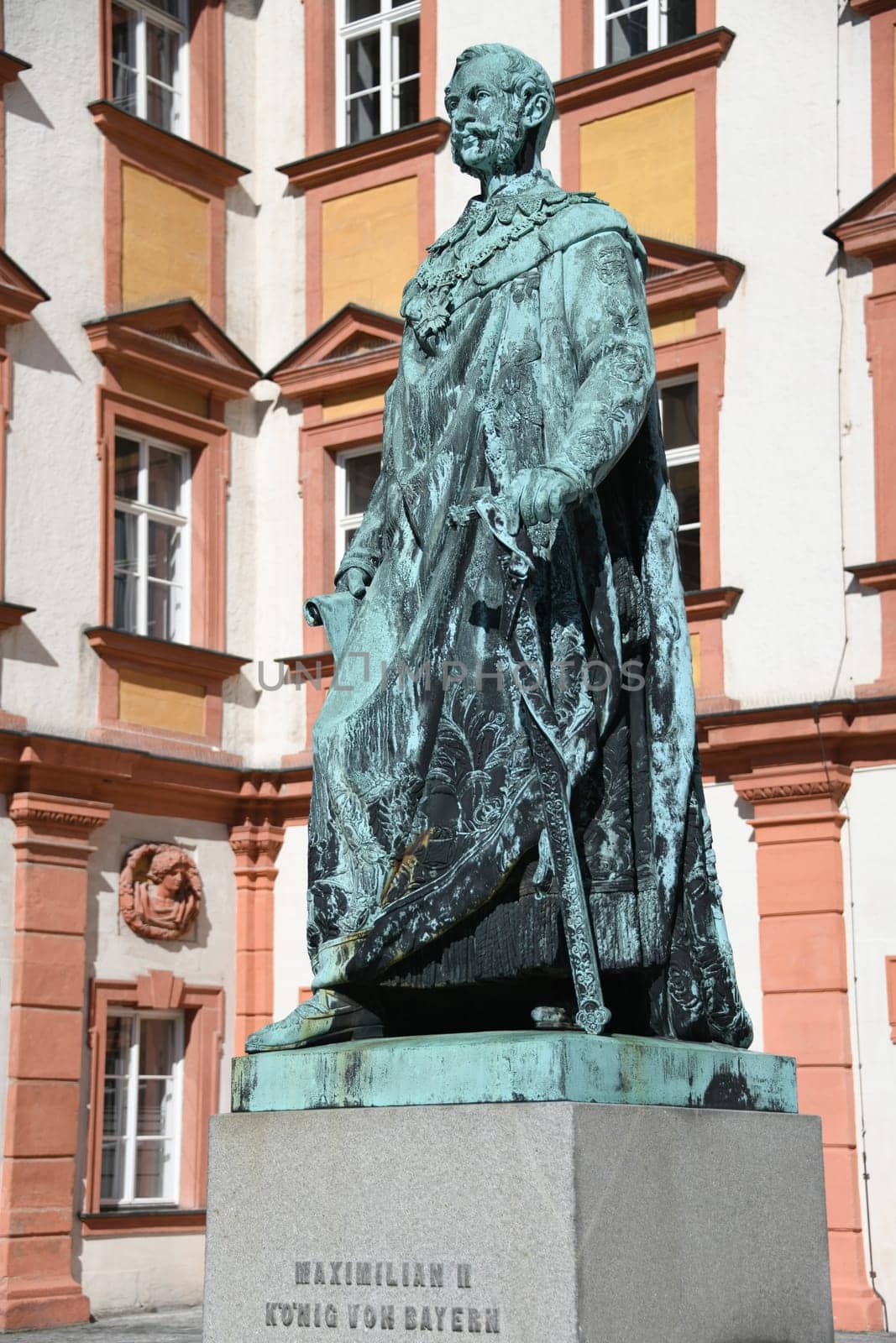 The monument to King Maximilian II of Bavaria stands in front of the Old Palace in Bayreuth on the courtyard. The statue of the Maximilian monument was cast in 1860 and stands on a granite base.